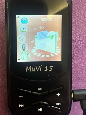 MuVi 15 MP3 player used with headphones and radio