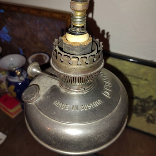 Lamp converted into adjustable light fixture