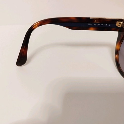 Lacoste tortoise sunglasses like new with blue stripe