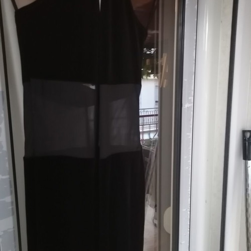 Black velvet jumpsuit with sheer mesh panel, halter neck
