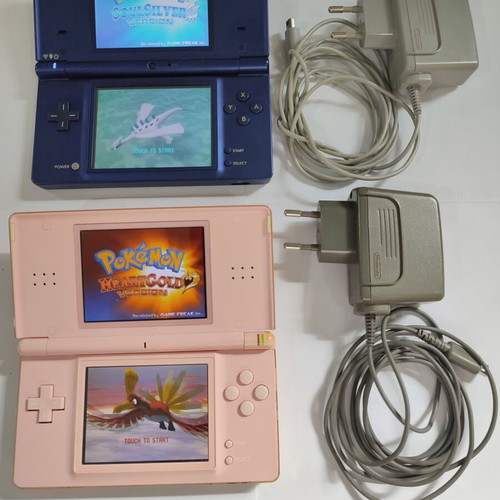 Nintendo DS Lite console with Pokemon SoulSilver and HeartGold games used