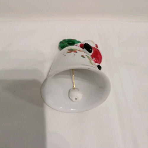 Ceramic bell like new with Santa Claus and wreath