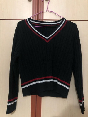 Knitted sweater new with soft wool fabric and V-neck