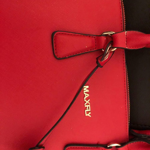 Red handbag used with wear marks