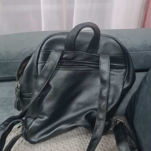 Black women's backpack in eco leather with metal studs
