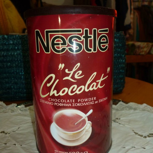 Nestle metal tin used, chocolate powder
