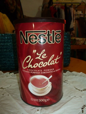 Nestle metal tin used, chocolate powder