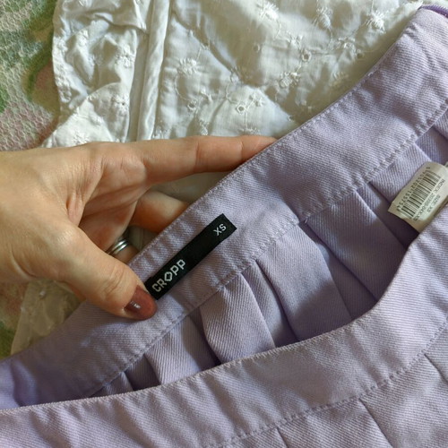 Mini skirt with pleats like new, pastel purple, size 34