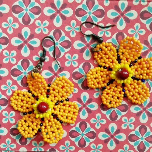 Floral earrings like new, orange, handmade from Africa