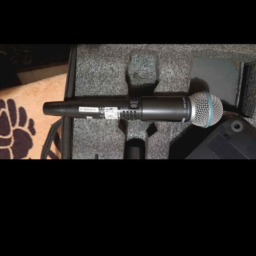 Shure Beta 58a GLXD4 wireless microphone used with case