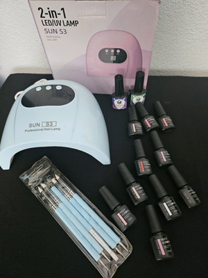 UV LED nail lamp with display like new with gel polishes and tools
