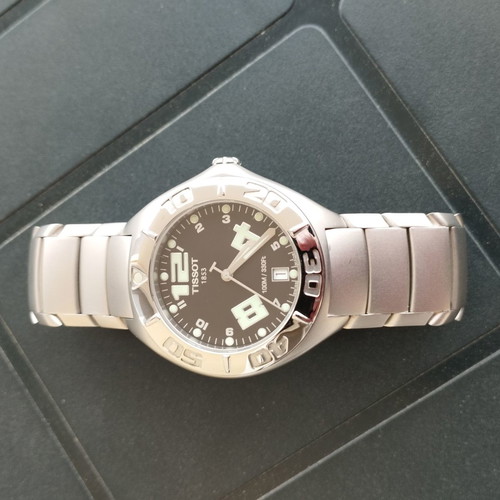 Tissot men's wristwatch like new, silver with sapphire crystal