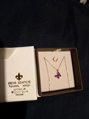 Gold 14k butterfly pendant new with purple zircon on 9k chain