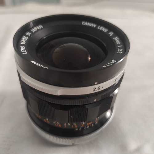 Canon FL 35mm f/2.5 wide-angle lens with HOYA 58mm 81A filter