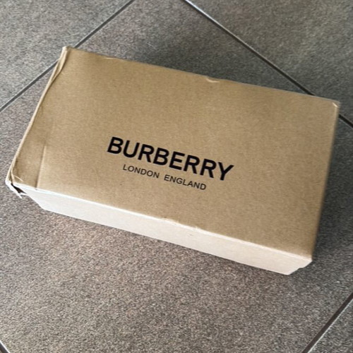 Burberry flip flops like new, size 45, black and orange