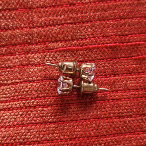 Gold-plated stud earrings with transparent zircon stones, like new