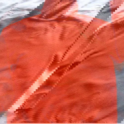 GAP kids hoodie used for ages 8-9, orange color