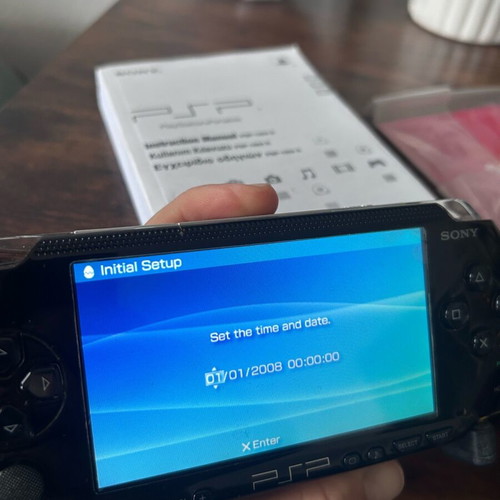 Sony PlayStation Portable PSP-1004 used with original box and accessories