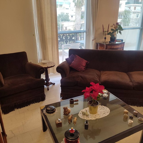 Handmade sofa used with brown velvet upholstery and walnut legs