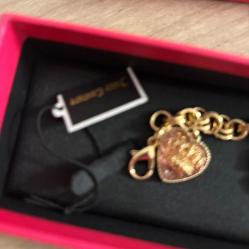 Juicy Couture bracelet with charms, like new, gold tone