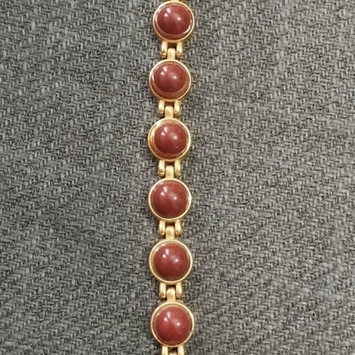 Vintage women's bracelet with red/brown cabochon beads on gold base, like new