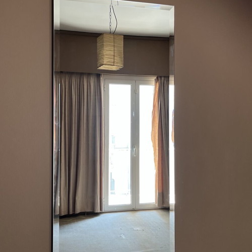 Mirror with corner damage