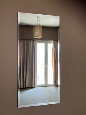 Mirror with corner damage