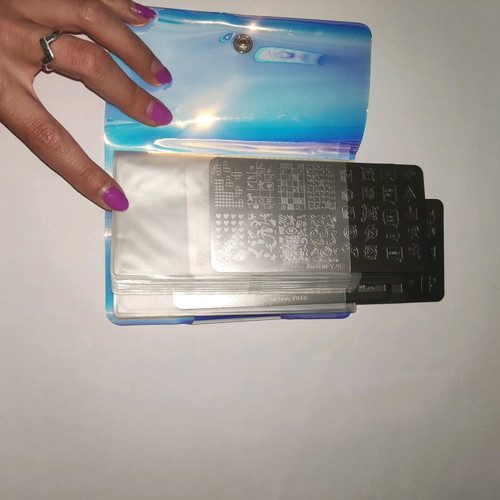 Nail stamping plates like new with storage book