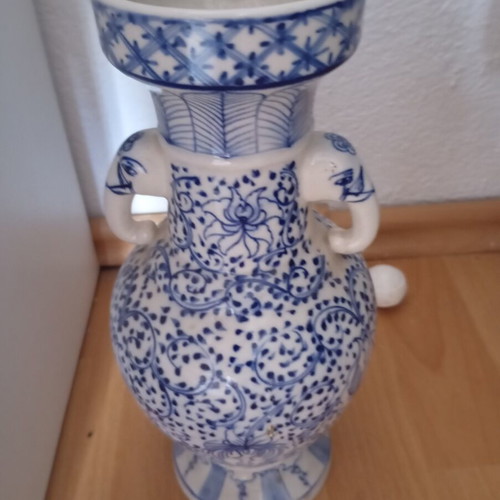 Vintage porcelain vase used, traditional Asian style blue and white Ming Qing design