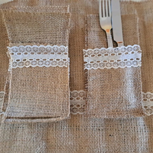 Runner made of burlap with 6 cutlery pockets used
