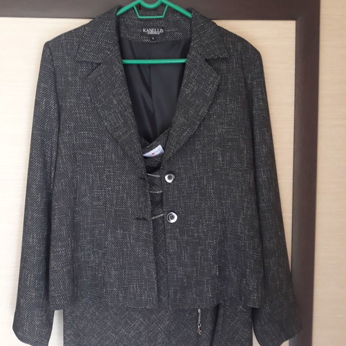 Gray suit used, jacket size 5, skirt size 54