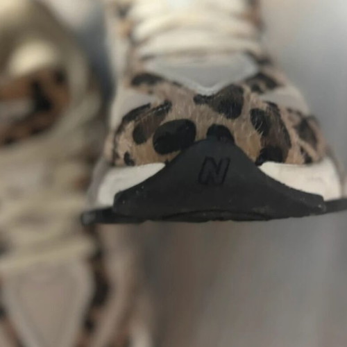 New Balance women's shoes with leopard print design