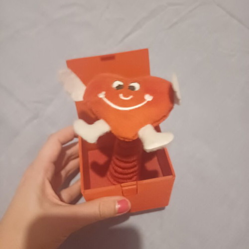 Surprise toy with plush heart
