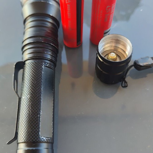 Rechargeable flashlight used with zoom and two LX 18650 6800mAh batteries