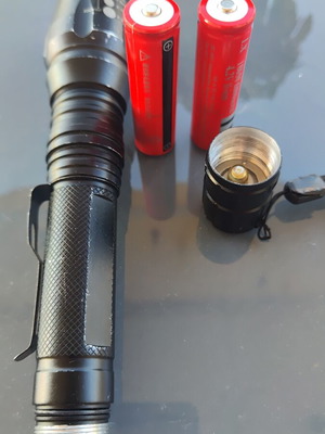 Rechargeable flashlight used with zoom and two LX 18650 6800mAh batteries