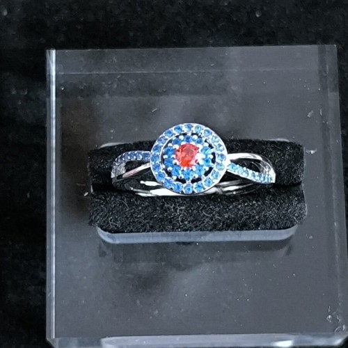 Ring with blue and red stones, elegant design