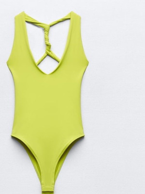 Lime bodysuit size S new with unique back design