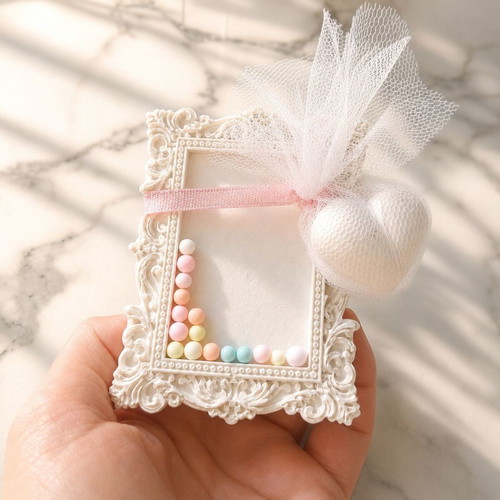 Vintage plaster frame with perfume bottle