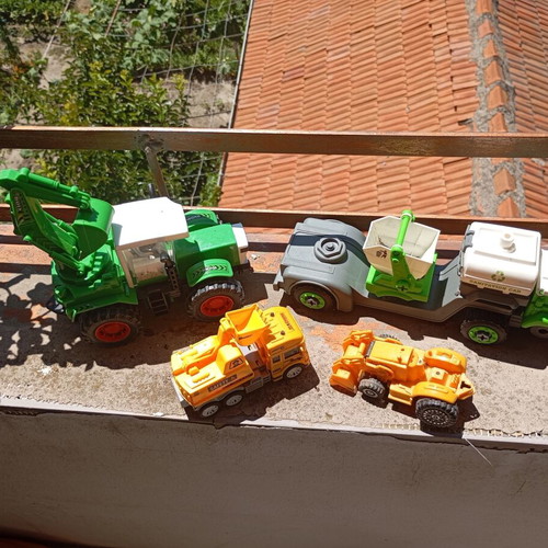 Children's construction and specialized toy trucks set of 4 used
