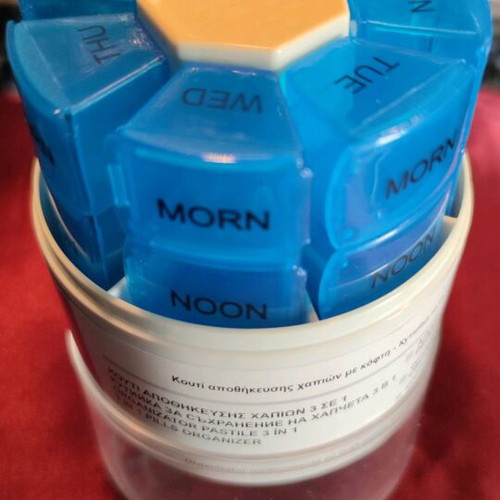 Rotating plastic weekly pill organizer new medication storage device