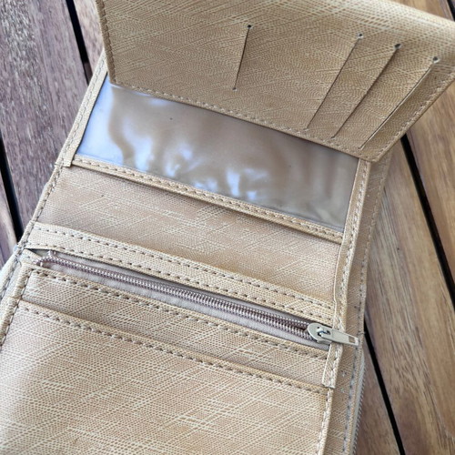 Wallet used, beige with multiple card slots
