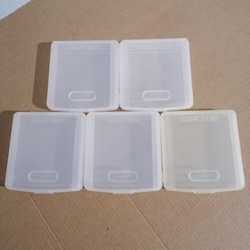 5 Sega Game Gear cartridge protective cases, 3 with themes