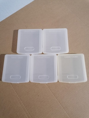 5 Sega Game Gear cartridge protective cases, 3 with themes