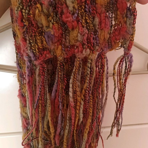 Multicolored scarf used with fringes in very good condition