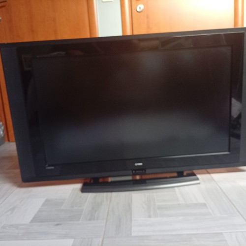 Funai 37-inch TV used with universal remote and decoder