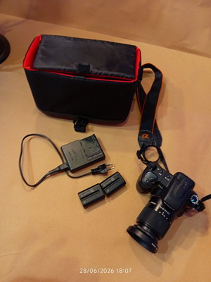Sony DSLR-A200 camera used with 18-70mm lens and accessories