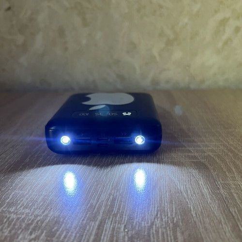 Power bank used with 3 cables and flashlight with two lamps