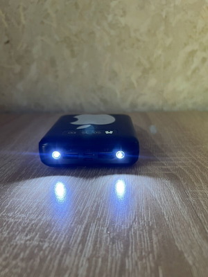 Power bank used with 3 cables and flashlight with two lamps