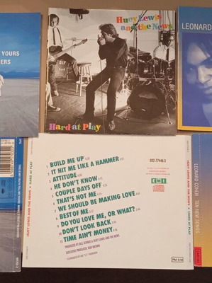 Booklets from Leonard Cohen, Huey Lewis, Manic Street Preachers used, rock