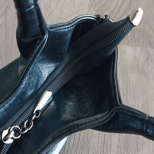 Handbag new with strap, black synthetic leather